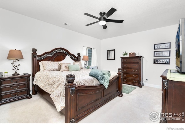 5524 Congressional Ct, Windsor, CO 80528 - bedroom with light colored carpet, a ceiling fan, and baseboards
