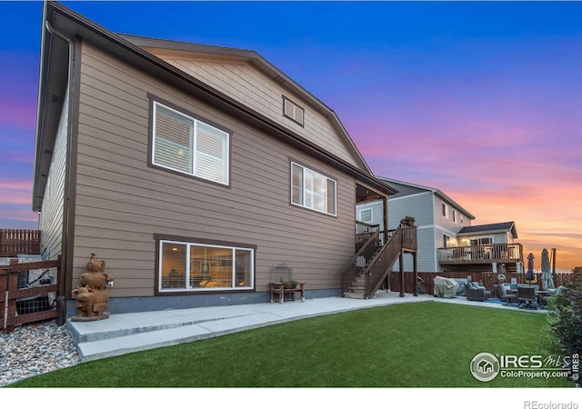 5524 Congressional Ct, Windsor, CO 80528 - rear view of house featuring a patio area, stairway, and a deck