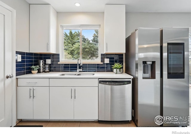 4035 Darley Ave, Boulder, CO 80305 - kitchen featuring stainless steel appliances, a sink, and white cabinets