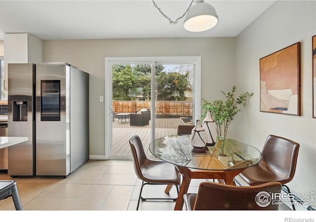 4035 Darley Ave, Boulder, CO 80305 - dining area featuring light tile patterned floors and baseboards