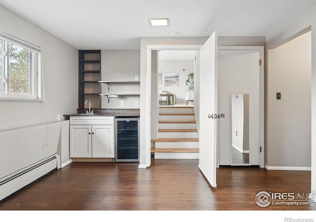 4035 Darley Ave, Boulder, CO 80305 - indoor wet bar with wine cooler, a baseboard radiator, dark wood finished floors, and stairway
