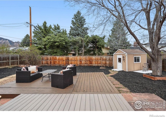 4035 Darley Ave, Boulder, CO 80305 - deck featuring a fenced backyard, outdoor lounge area, a storage shed, and an outdoor structure