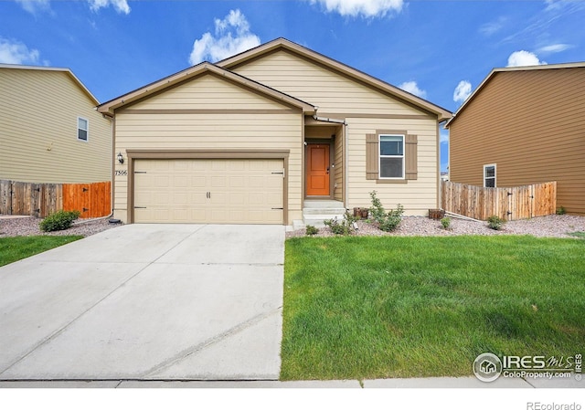 ranch-style home with driveway and a garage