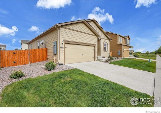 view of front facade featuring concrete driveway and a garage