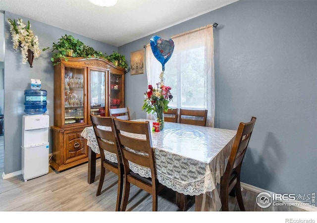 316 43rd Avenue Ct, Greeley, CO 80634 - dining space featuring light wood finished floors and baseboards