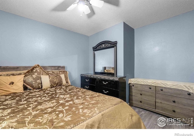 316 43rd Avenue Ct, Greeley, CO 80634 - bedroom featuring wood finished floors and ceiling fan