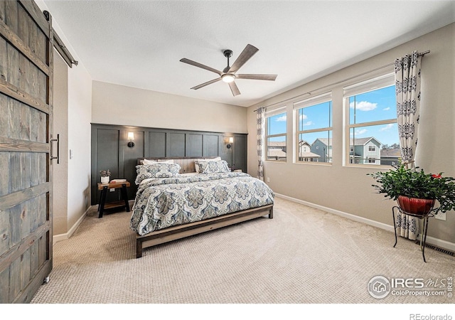 6009 Autumn Breeze Ct, Fort Collins, CO 80528 - bedroom with light colored carpet, baseboards, and ceiling fan