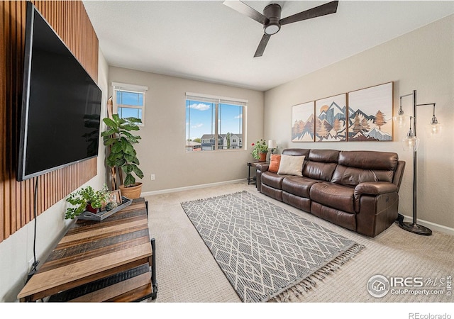 6009 Autumn Breeze Ct, Fort Collins, CO 80528 - carpeted living area with ceiling fan and baseboards