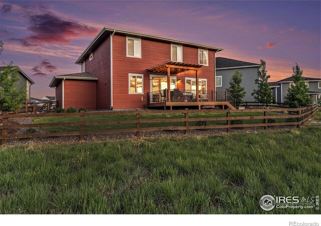 6009 Autumn Breeze Ct, Fort Collins, CO 80528 - rear view of property featuring a pergola and a fenced backyard