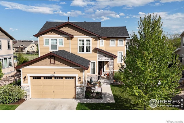8241 White Owl Ct, Windsor, CO 80550 - craftsman-style home featuring stone siding, driveway, an attached garage, and a shingled roof