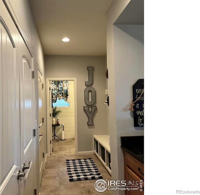 8241 White Owl Ct, Windsor, CO 80550 - mudroom featuring recessed lighting and light tile patterned flooring