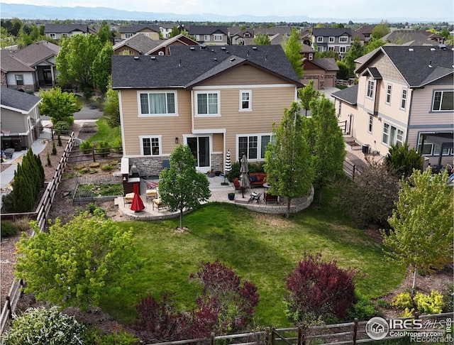 8241 White Owl Ct, Windsor, CO 80550 - rear view of property with a residential view, a patio, and a fenced backyard