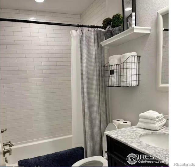 8241 White Owl Ct, Windsor, CO 80550 - bathroom with shower / bath combo with shower curtain and vanity