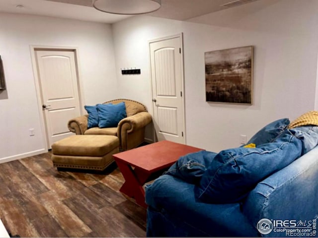 8241 White Owl Ct, Windsor, CO 80550 - living room with wood finished floors and baseboards