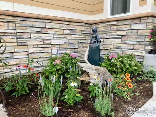 8241 White Owl Ct, Windsor, CO 80550 - exterior view of stone siding
