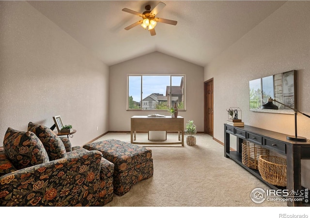 7717 Amour Hill Dr, Greeley, CO 80634 - carpeted living area featuring ceiling fan, lofted ceiling, and baseboards
