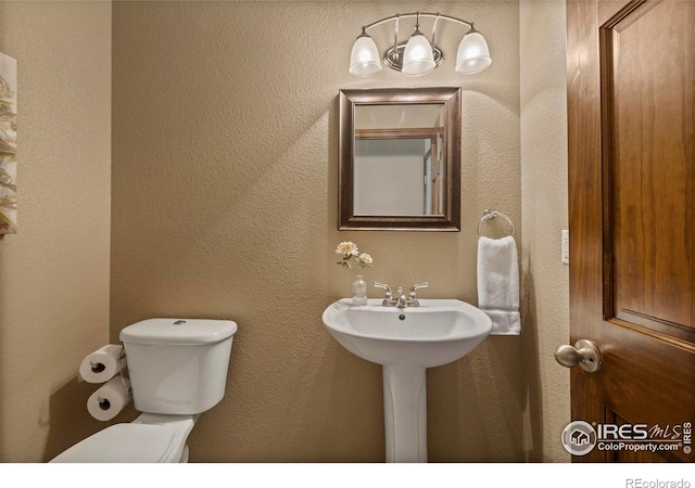 7717 Amour Hill Dr, Greeley, CO 80634 - bathroom with toilet and a sink