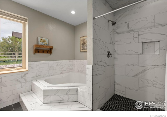 7717 Amour Hill Dr, Greeley, CO 80634 - bathroom with a bath, a tile shower, and recessed lighting