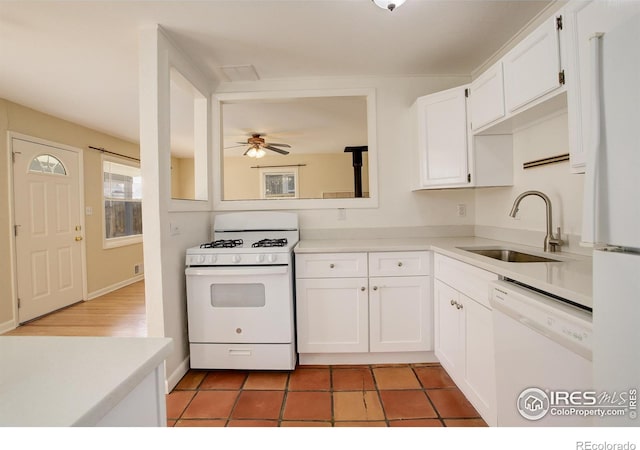 503 E Oak St, Lafayette, CO 80026 - kitchen with white appliances, a sink, white cabinetry, light countertops, and ceiling fan
