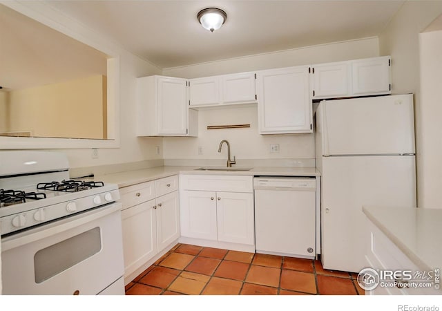 503 E Oak St, Lafayette, CO 80026 - kitchen featuring white appliances, a sink, light countertops, white cabinetry, and light tile patterned flooring