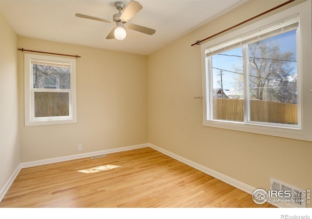 503 E Oak St, Lafayette, CO 80026 - unfurnished room featuring light wood finished floors, baseboards, and a ceiling fan