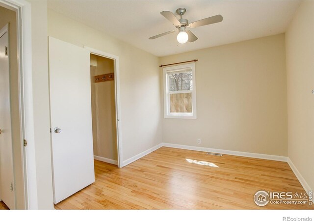 503 E Oak St, Lafayette, CO 80026 - unfurnished bedroom with light wood-style flooring, baseboards, and ceiling fan