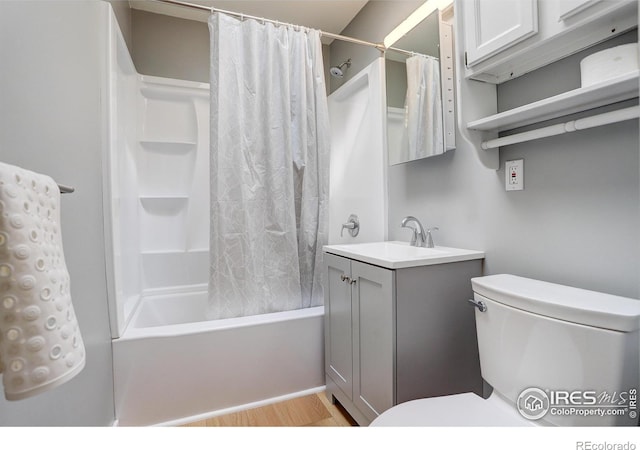 503 E Oak St, Lafayette, CO 80026 - bathroom with toilet, wood finished floors, shower / bath combo, and vanity