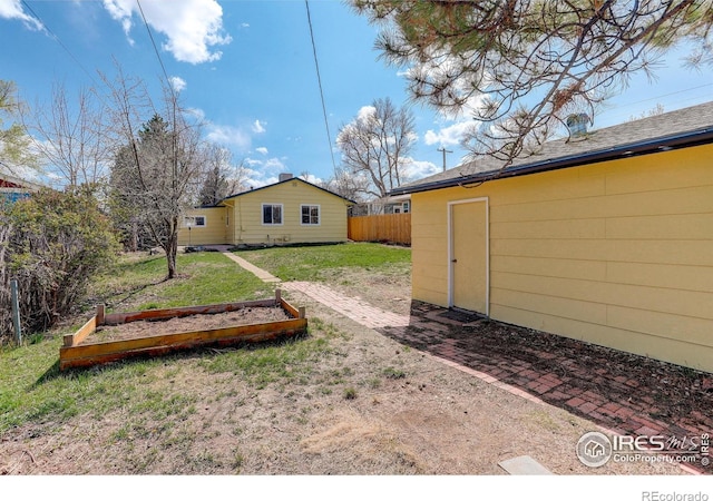 503 E Oak St, Lafayette, CO 80026 - view of yard with a vegetable garden