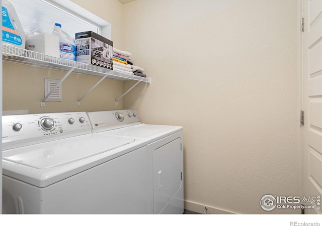 512 Prairie Clover Way, Severance, CO 80550 - laundry room with washer and dryer