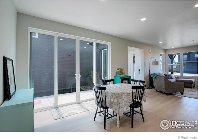 5282 Ribault St, Timnath, CO 80547 - dining room with wood finished floors and recessed lighting