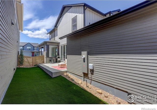 5282 Ribault St, Timnath, CO 80547 - view of side of property with board and batten siding