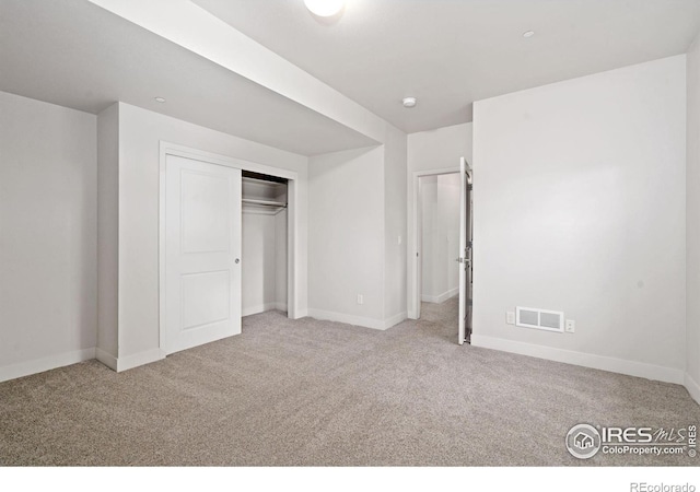 4014 Rock Creek Dr, Fort Collins, CO 80528 - unfurnished bedroom featuring carpet, baseboards, and a closet
