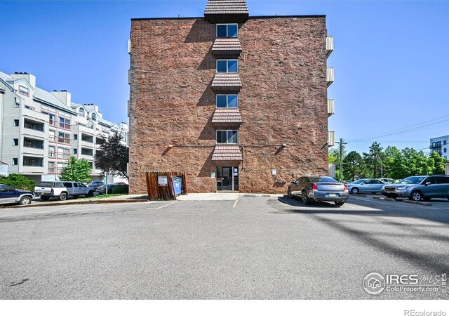 4110 Hale Pkwy # 5F, Denver, CO 80220 - view of apartment building / complex with uncovered parking