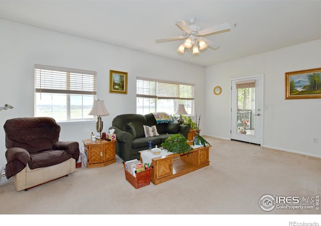 5014 Northern Lights Dr, Fort Collins, CO 80528 - living room featuring carpet, plenty of natural light, and a ceiling fan