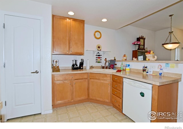 5014 Northern Lights Dr, Fort Collins, CO 80528 - kitchen with dishwasher, a peninsula, a sink, light countertops, and light floors