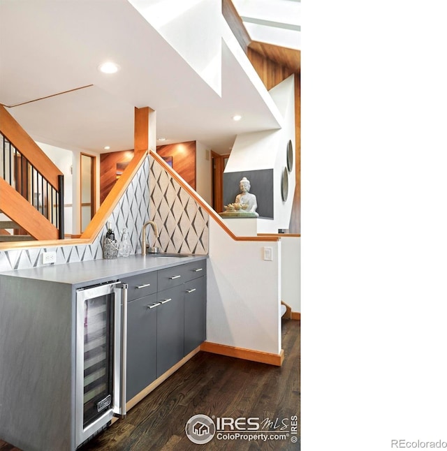 3746 Wonderland Hill Ave, Boulder, CO 80304 - stairway featuring wine cooler, wood finished floors, wet bar, recessed lighting, and baseboards