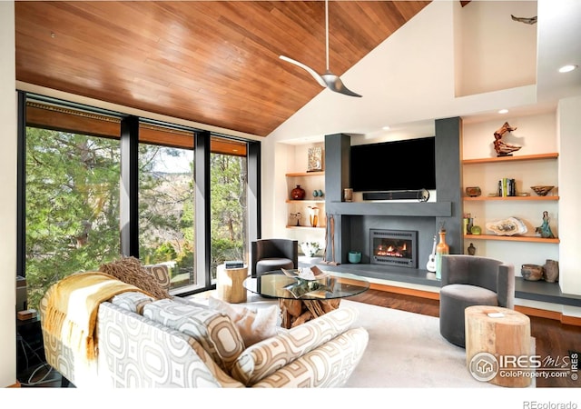3746 Wonderland Hill Ave, Boulder, CO 80304 - living area featuring wooden ceiling, built in features, wood finished floors, a lit fireplace, and a ceiling fan