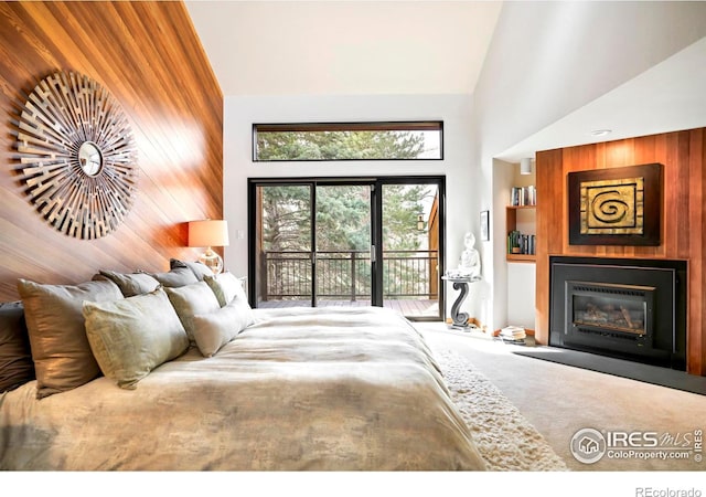 3746 Wonderland Hill Ave, Boulder, CO 80304 - carpeted bedroom featuring access to outside, high vaulted ceiling, and a large fireplace