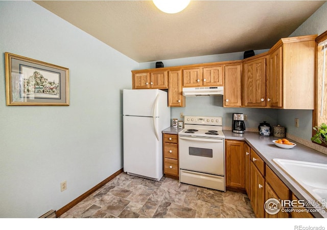 60 Horn Peak Dr, Livermore, CO 80536 - kitchen with white appliances, under cabinet range hood, baseboards, a sink, and brown cabinetry