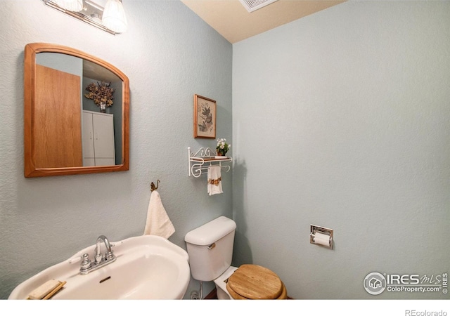 60 Horn Peak Dr, Livermore, CO 80536 - half bath featuring a sink and toilet