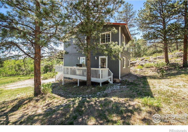 60 Horn Peak Dr, Livermore, CO 80536 - rear view of house featuring a deck and stairs
