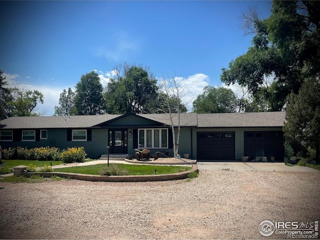 45313 County Road 41, Pierce, CO 80650 - ranch-style house with driveway and an attached garage
