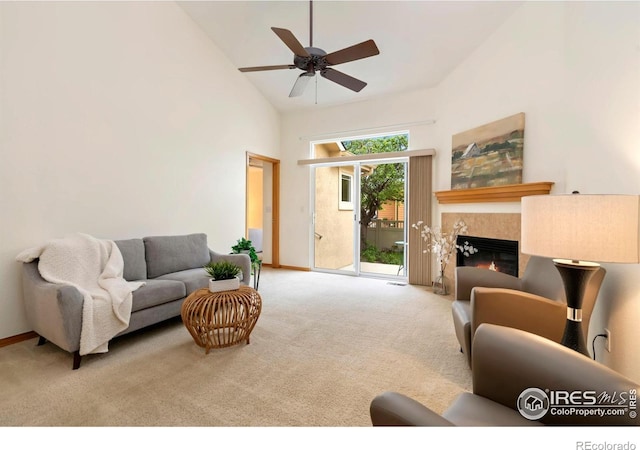 4603 Dusty Sage Ct Unit 4, Fort Collins, CO 80526 - carpeted living room featuring high vaulted ceiling, a fireplace, ceiling fan, and baseboards