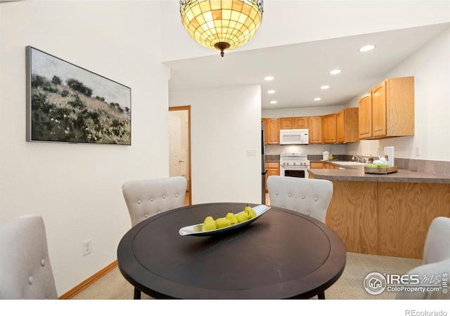 4603 Dusty Sage Ct Unit 4, Fort Collins, CO 80526 - dining area featuring light carpet, recessed lighting, and baseboards