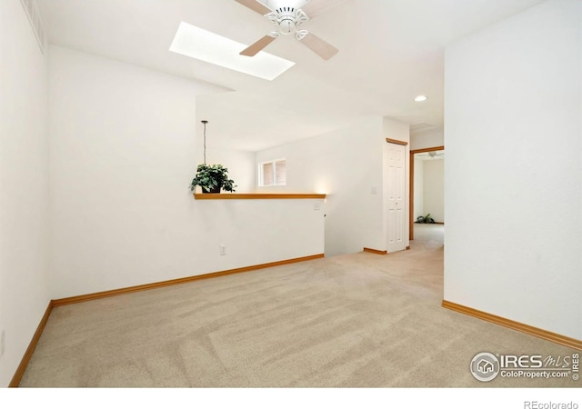 4603 Dusty Sage Ct Unit 4, Fort Collins, CO 80526 - carpeted spare room featuring a skylight, a ceiling fan, recessed lighting, and baseboards