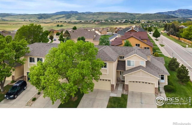 4603 Dusty Sage Ct Unit 4, Fort Collins, CO 80526 - aerial perspective of suburban area with a mountain backdrop
