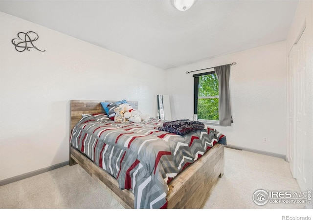 5196 32nd St, Greeley, CO 80634 - bedroom featuring carpet and baseboards