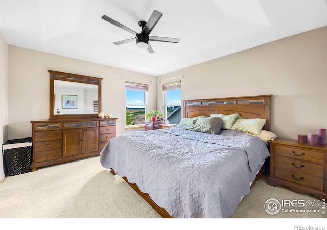 5196 32nd St, Greeley, CO 80634 - bedroom with light colored carpet and a ceiling fan