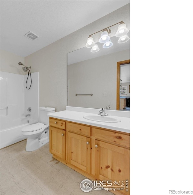 65 La Chula Rd, Black Hawk, CO 80422 - bathroom featuring toilet, vanity, shower / bathtub combination, and tile patterned floors