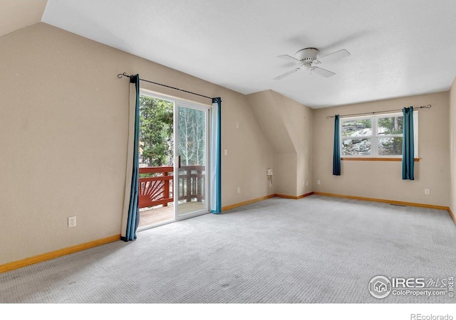 65 La Chula Rd, Black Hawk, CO 80422 - carpeted empty room featuring plenty of natural light, a ceiling fan, baseboards, and lofted ceiling